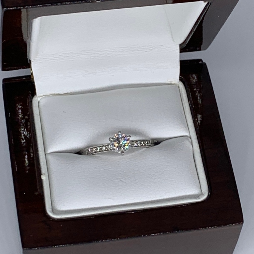 Platinum diamond engagement ring and matching wedding band